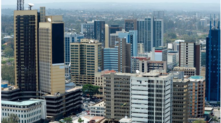 Stunning skyline of Nairobi with modern skyscrapers, verdant parks and wildlife reserves visible in the distance